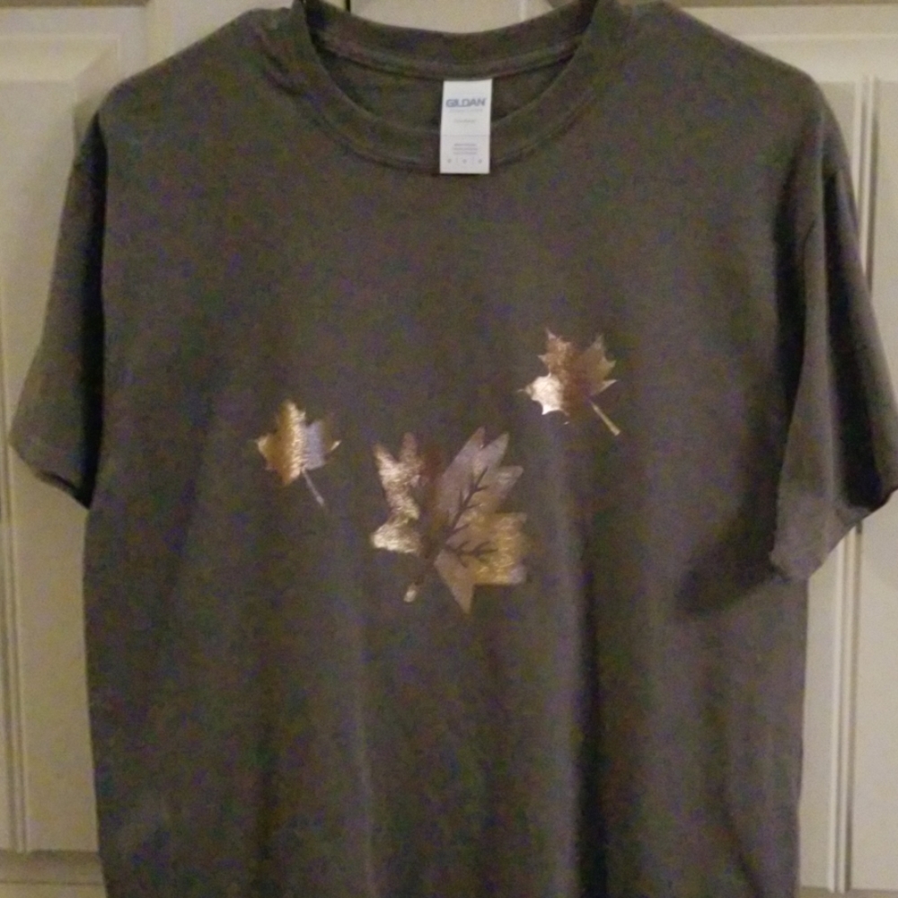 Beautiful grey t shirt decorated with gold leaf